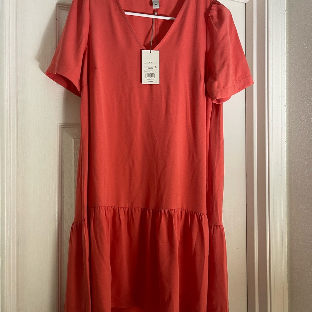 Cute Salmon color babydoll dress.
